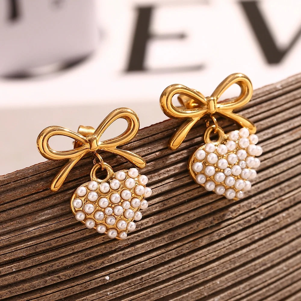 Boucles d'oreilles en or avec perle en forme de coeur