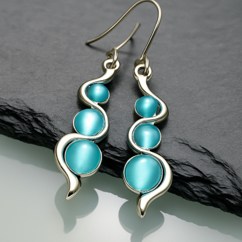Boucles d'oreilles Pendantes en Forme de Vague avec Pierre Bleue