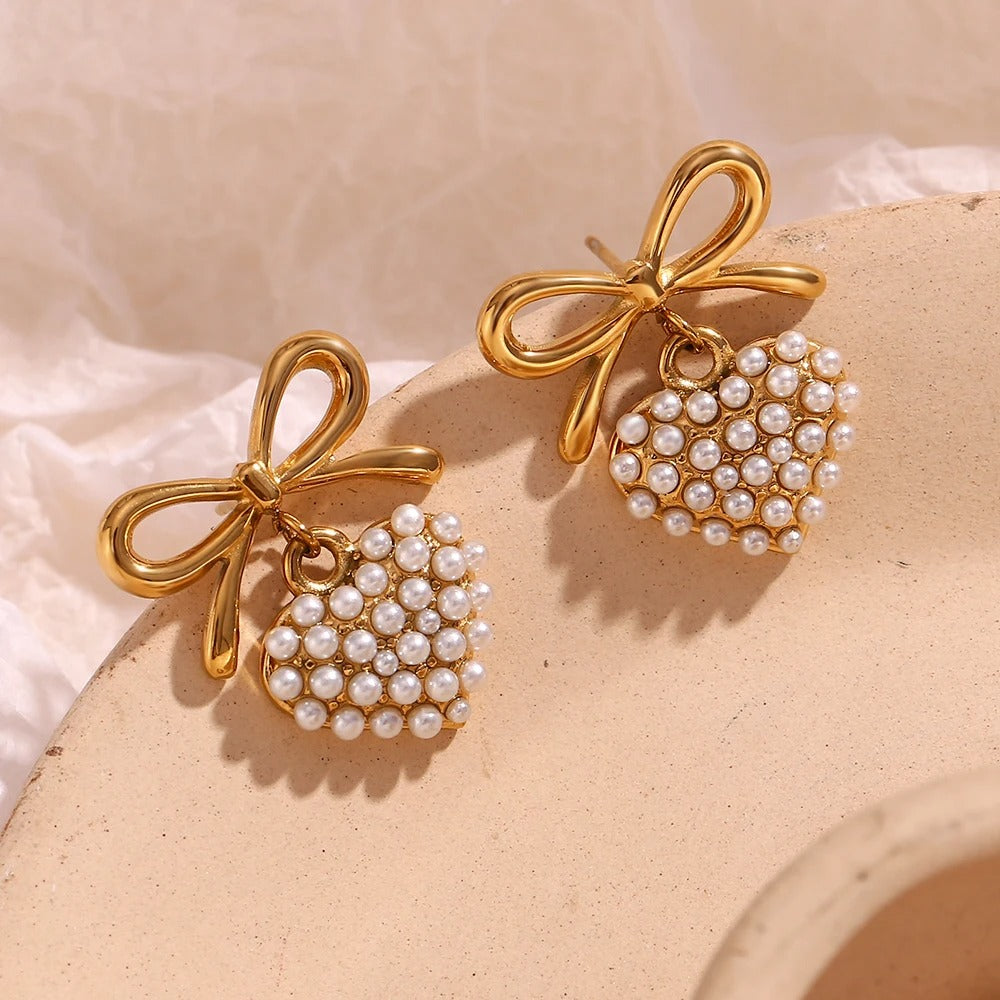 Boucles d'oreilles en or avec perle en forme de coeur