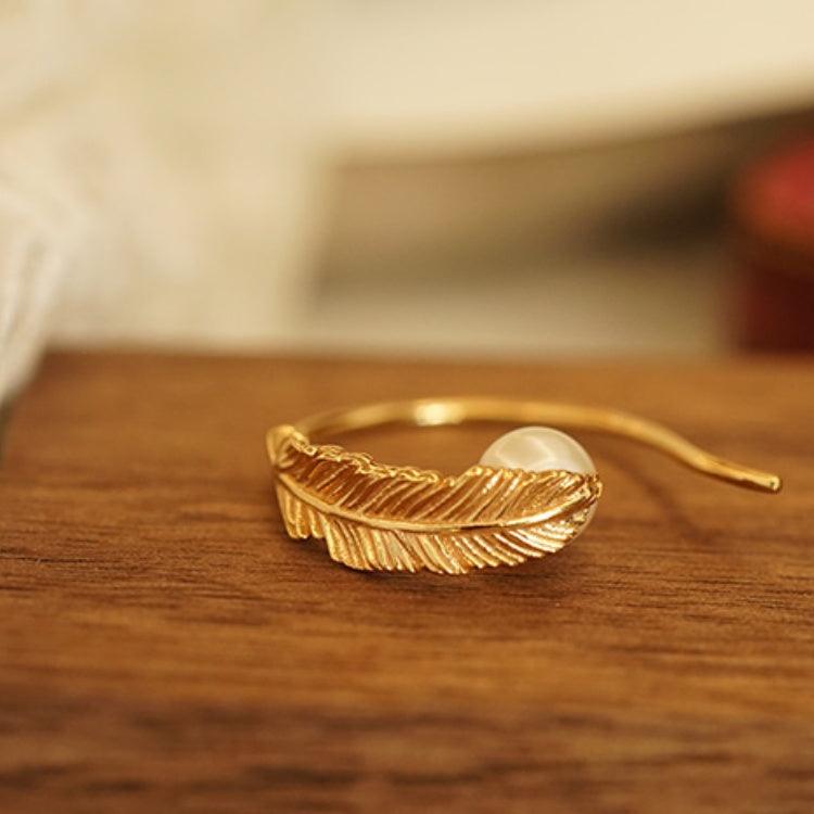 Boucles d'oreilles Perle avec Plume