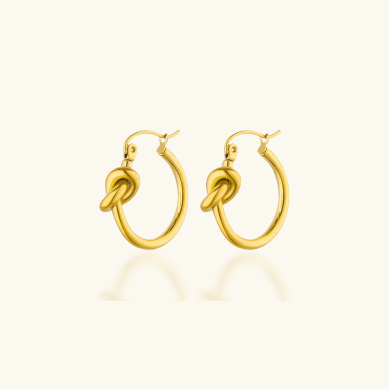 Boucles d'oreilles créoles nœud plaqué or