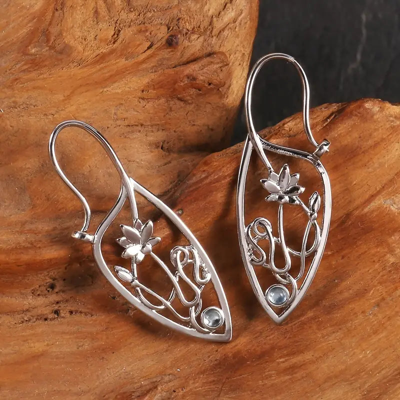 Boucles d'Oreilles Pendantes en Argenté Lotus Creux Vintage