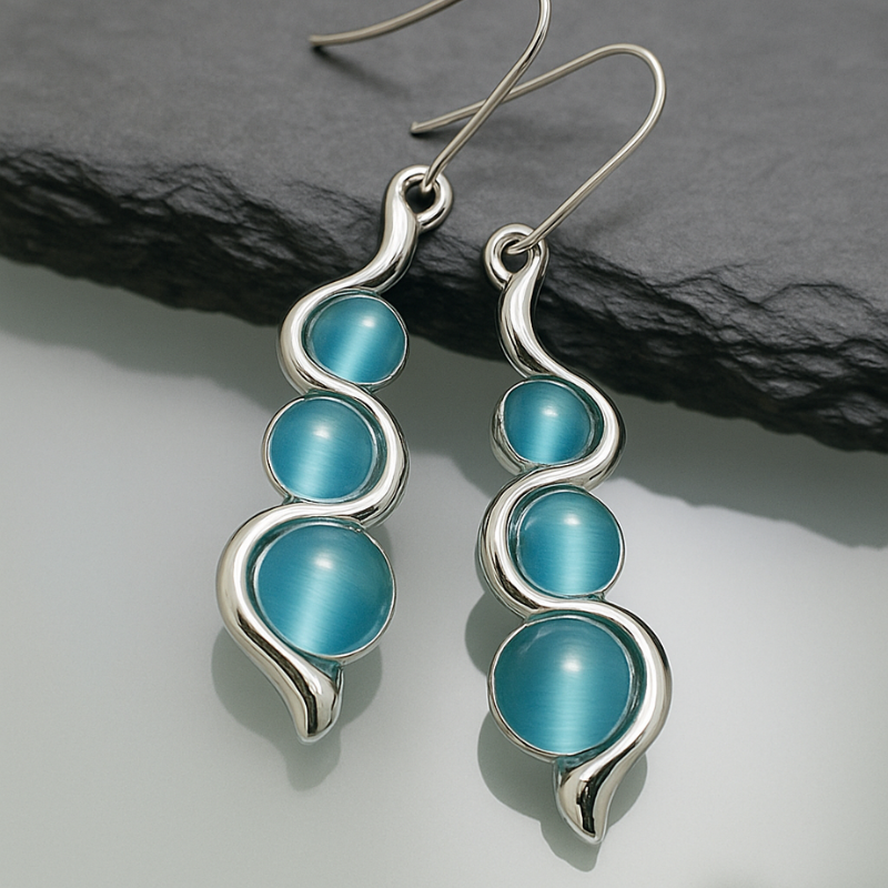 Boucles d'oreilles Pendantes en Forme de Vague avec Pierre Bleue