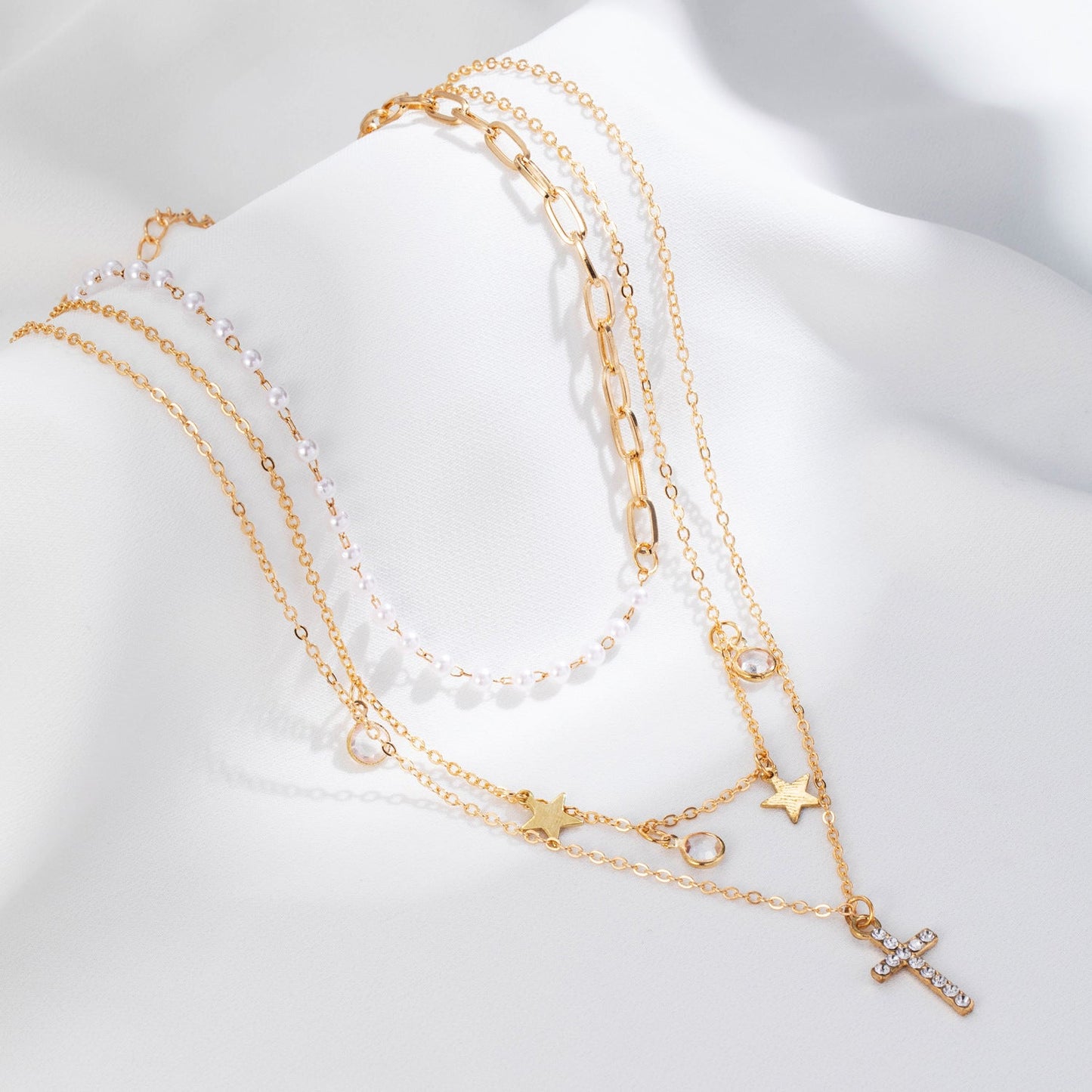 Colliers chaînes dorées pendentifs perles étoiles zircon – Léo