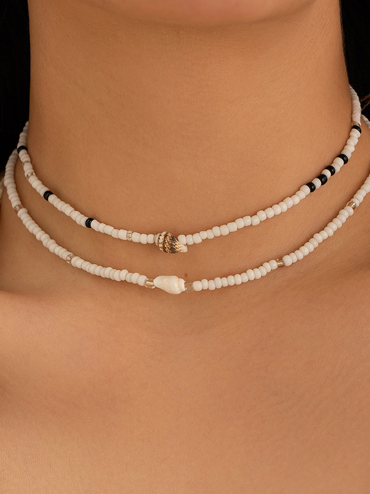 Collier choker perles blanches noires coquillages – Lila
