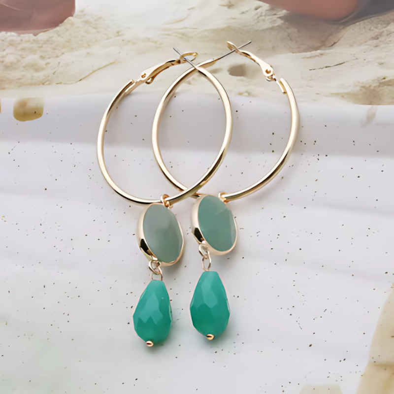 Boucles d'oreilles créoles dorées avec pierres colorées