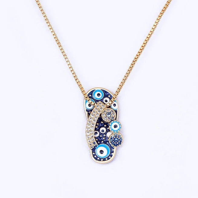 Pendentif tong or strass œil bleu – Léo