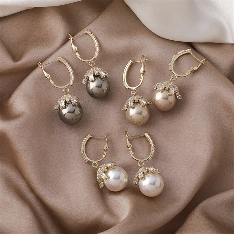Boucles d’oreilles pendantes perle beige plaqué or – Lila