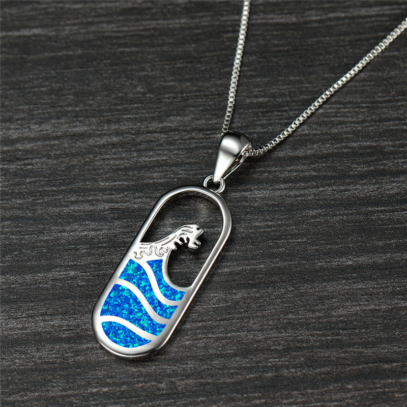 Collier pendentif vague opale bleue argent – Léo