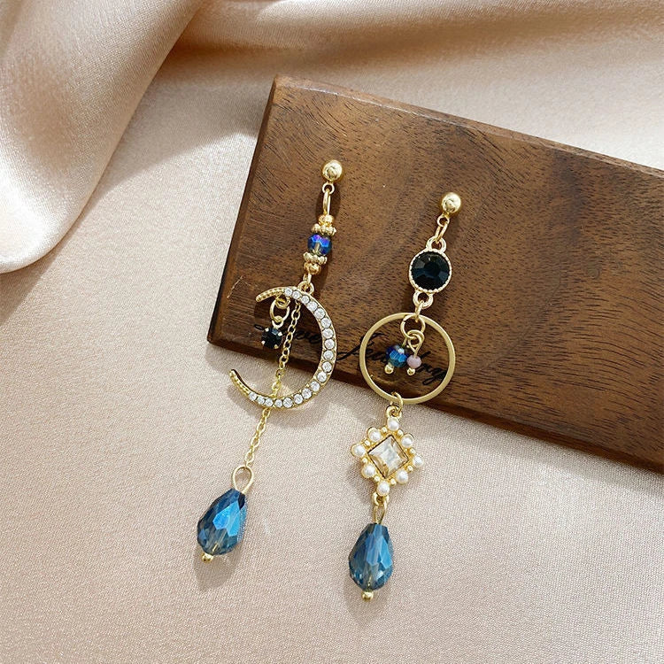 Boucles d’oreilles pendantes doré cristal bleu croissant – Lila