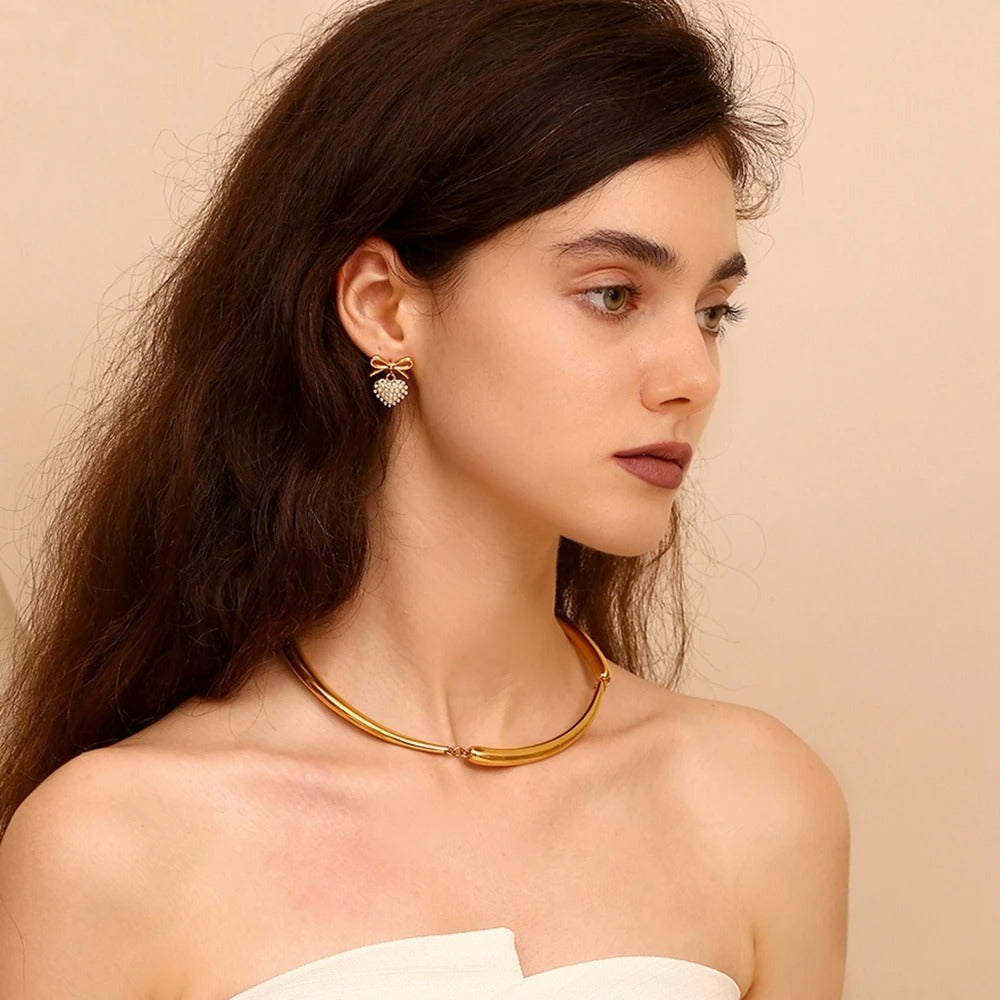 Boucles d'oreilles en or avec perle en forme de coeur