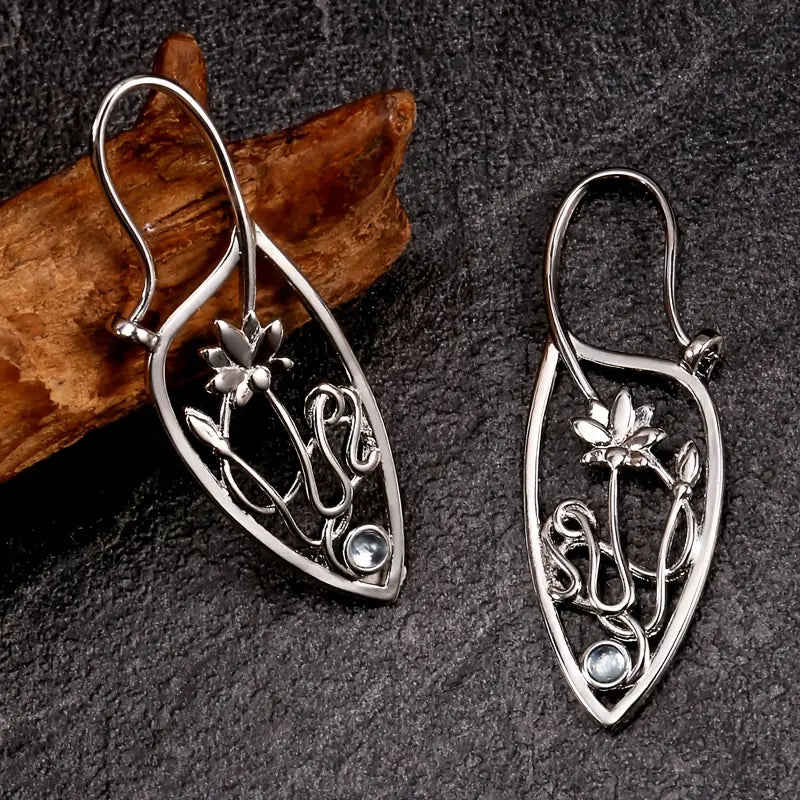Boucles d'Oreilles Pendantes en Argenté Lotus Creux Vintage