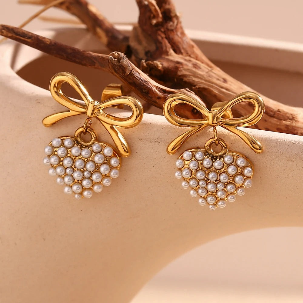 Boucles d'oreilles en or avec perle en forme de coeur