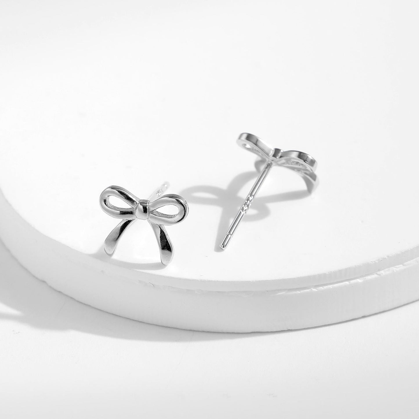 Clous d’oreilles nœud argent – Lise