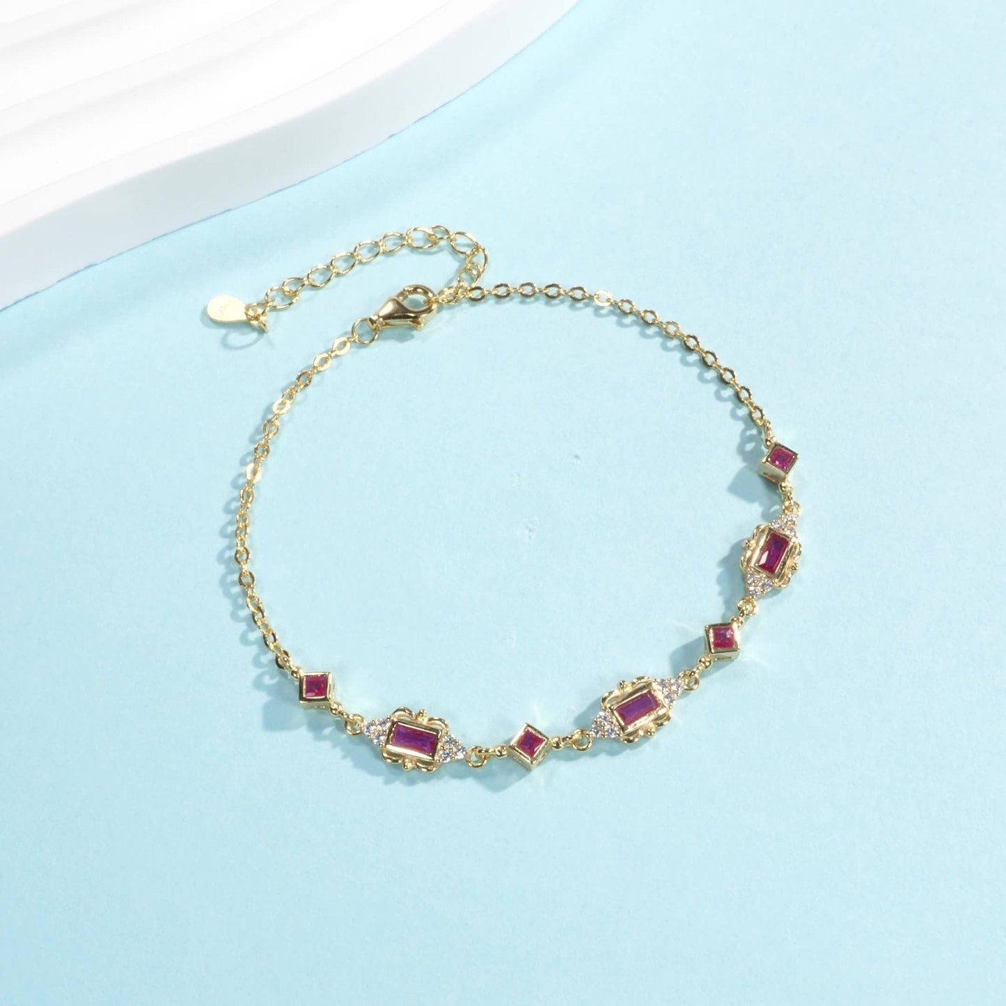 Bracelet maillons losange doré sertis – Léo