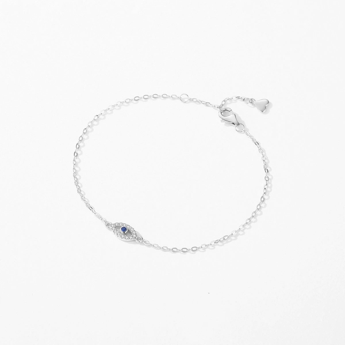 Bracelet chaîne argent pendentif œil cristaux bleu – Noé