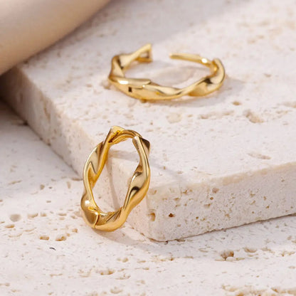 Boucles d'oreilles torsadées élégantes