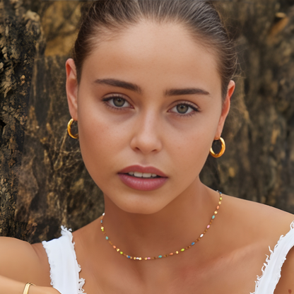 Boucles d'Oreilles en Hoops Tordues Dorées