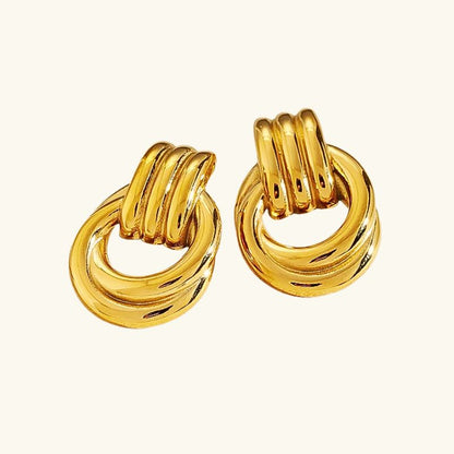 Boucles d'Oreilles Superposées en Or et Argent