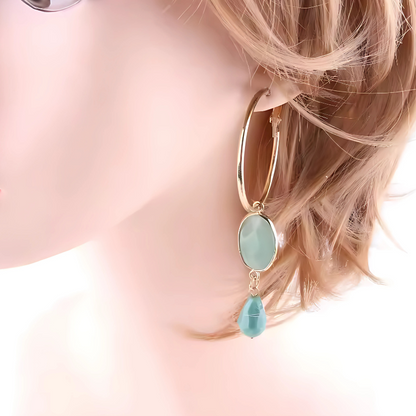 Boucles d'oreilles créoles dorées avec pierres colorées