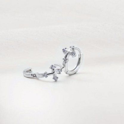 Créoles en forme de croix avec zircon étincelant