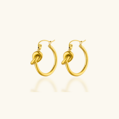 Boucles d'oreilles créoles nœud plaqué or