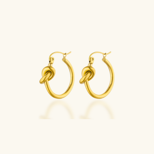 Boucles d'oreilles créoles nœud plaqué or