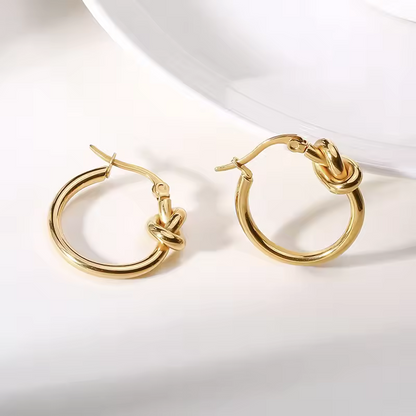 Boucles d'oreilles créoles nœud plaqué or