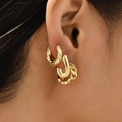 Boucles d'oreilles créoles torsadées plaqué or