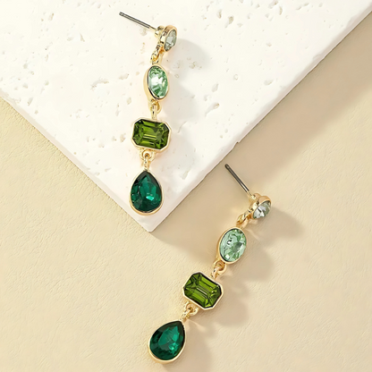 Boucles d'oreilles dorées avec cristaux verts plaqué or