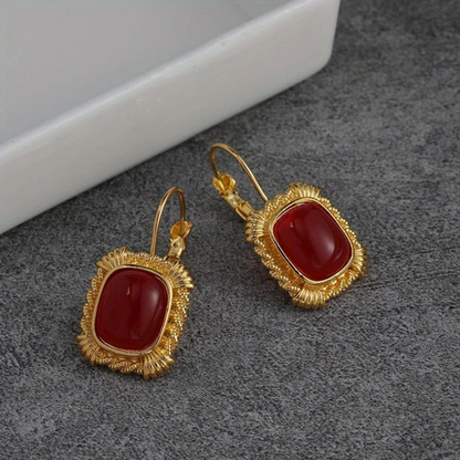 Boucles d'oreilles vintage dorées avec pierre précieuse rouge plaqué or