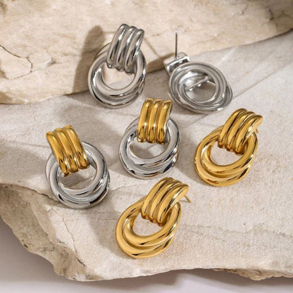 Boucles d'Oreilles Superposées en Or et Argent