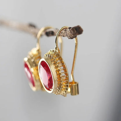 Boucles d'oreilles Plaquées or avec Pierres Rouges