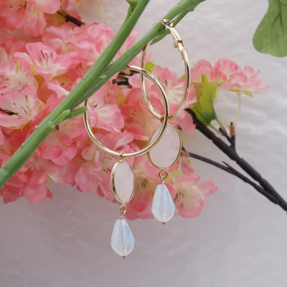 Boucles d'oreilles créoles dorées avec pierres colorées