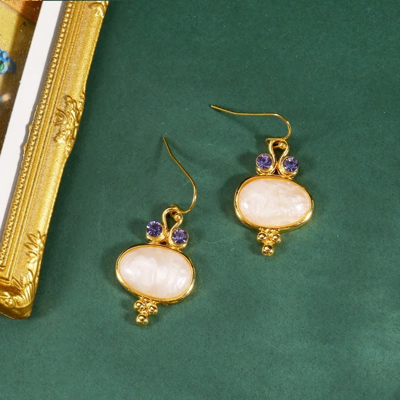 Boucles d'oreilles ovales boho avec pierres plaqué or