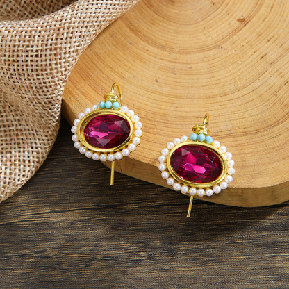 Boucles d'oreilles vintage cristal rouge plaqué or