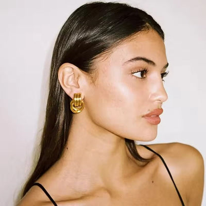 Boucles d'Oreilles Superposées en Or et Argent