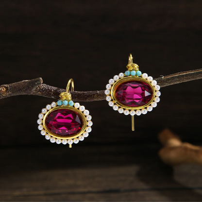 Boucles d'oreilles vintage cristal rouge plaqué or