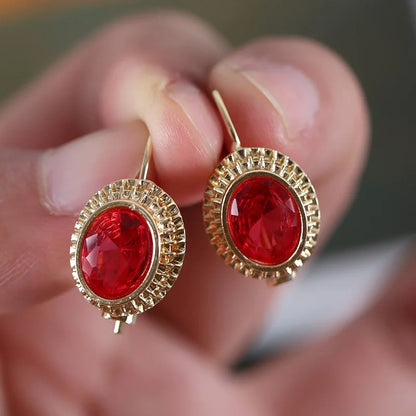 Boucles d'oreilles Plaquées or avec Pierres Rouges