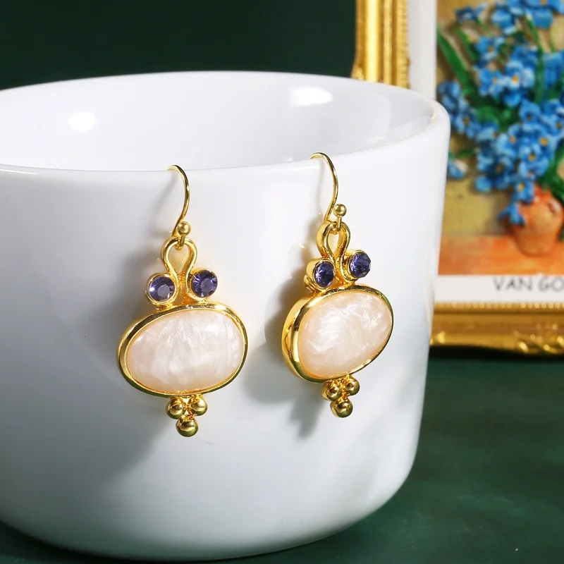 Boucles d'oreilles ovales boho avec pierres plaqué or