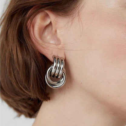 Boucles d'Oreilles Superposées en Or et Argent