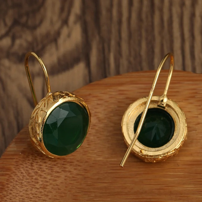 Boucles d'oreilles avec pierre précieuse verte plaqué or