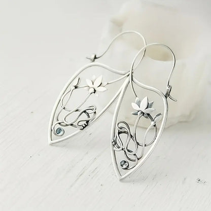 Boucles d'Oreilles Pendantes en Argenté Lotus Creux Vintage