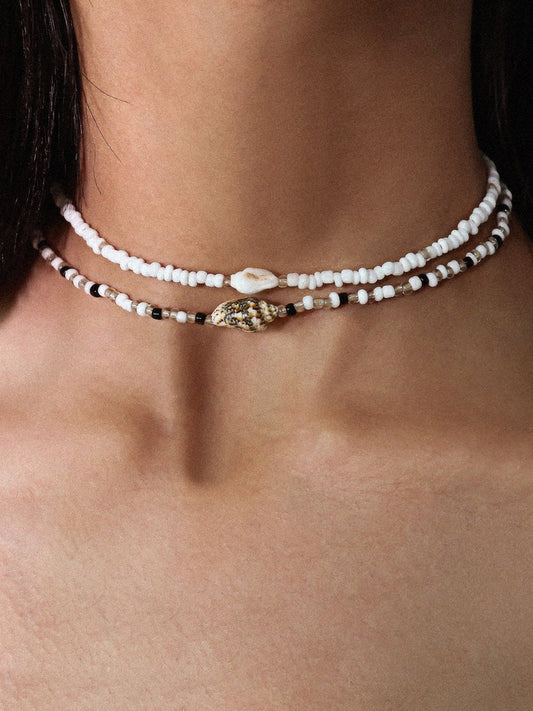 Collier choker perles blanches noires coquillages – Lila