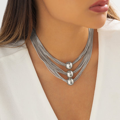 Collier choker multi-couches or géométrique – Lise