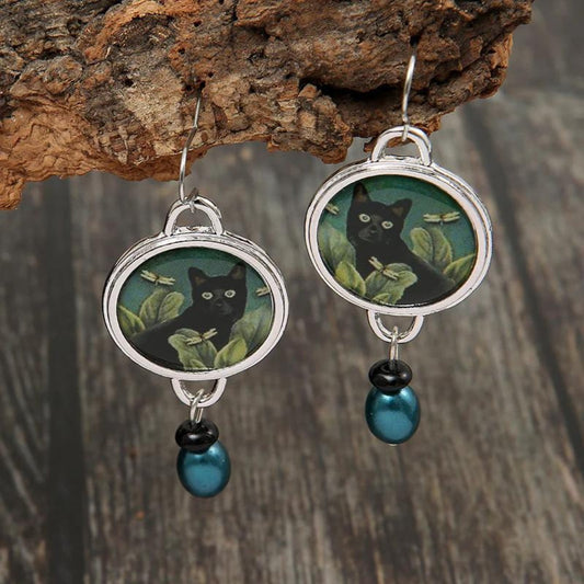 Boucles d’oreilles pendantes acrylique argenté perle bleue – Léo