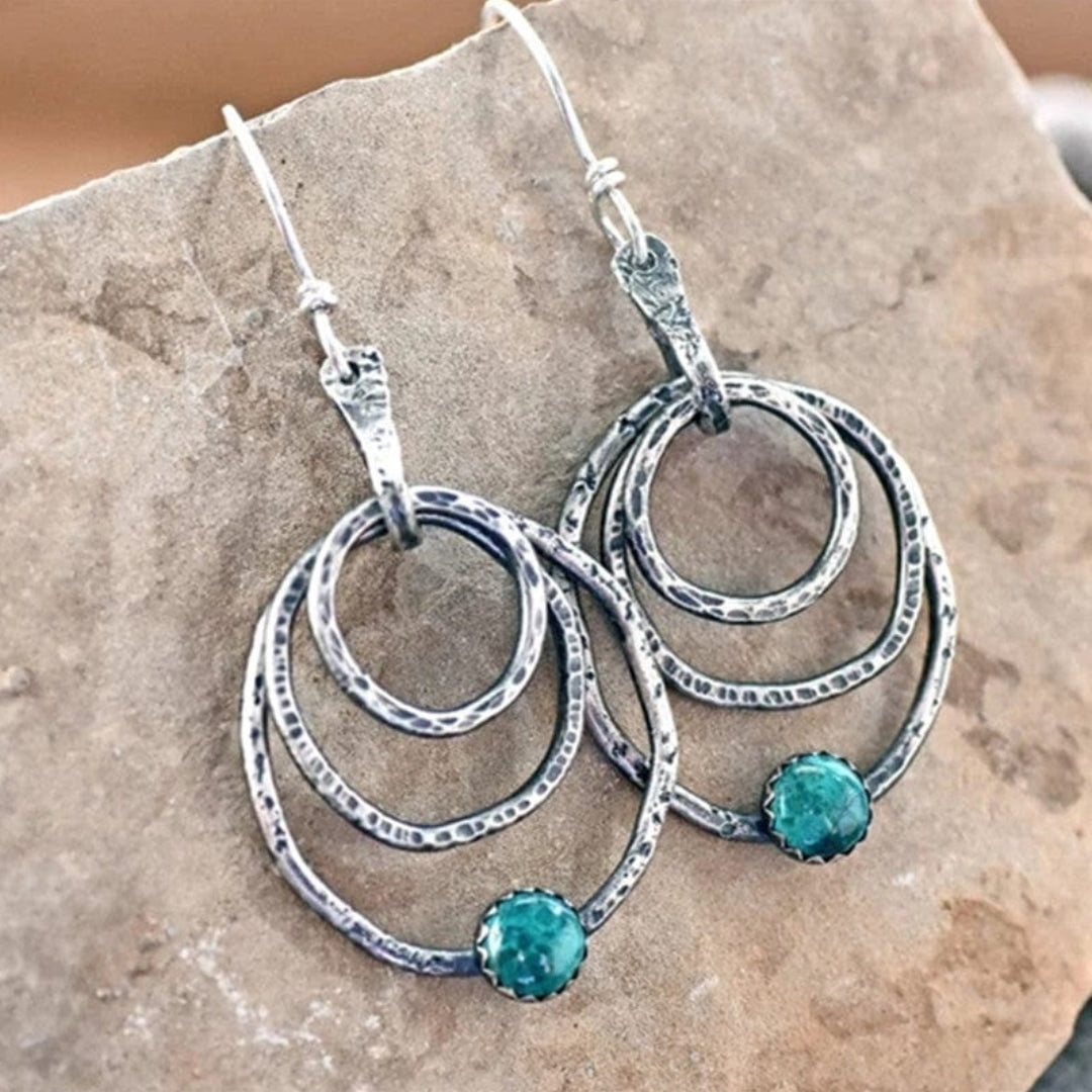 Boucles d’oreilles spirales argent opale bleue – Lila