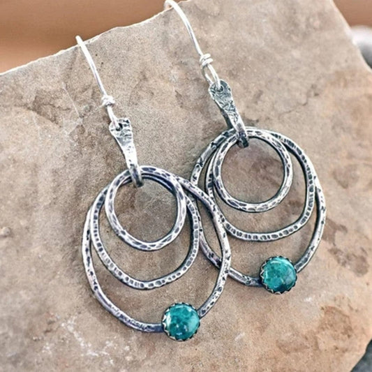 Boucles d’oreilles spirales argent opale bleue – Lila