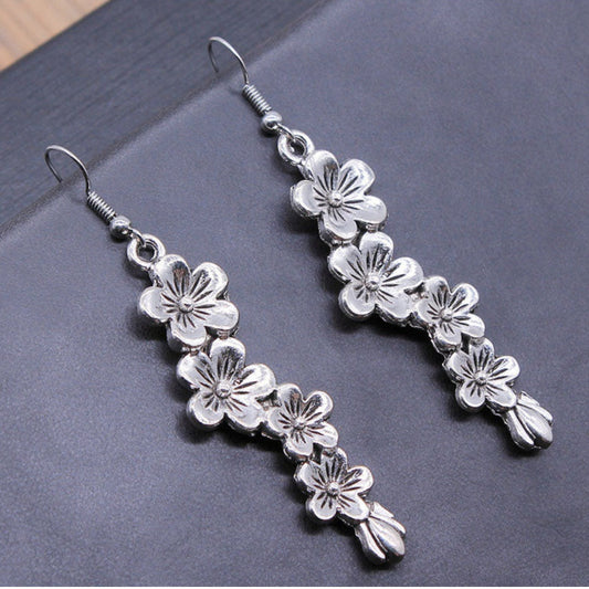 Boucles d’oreilles pendantes argent motifs floraux – Lila