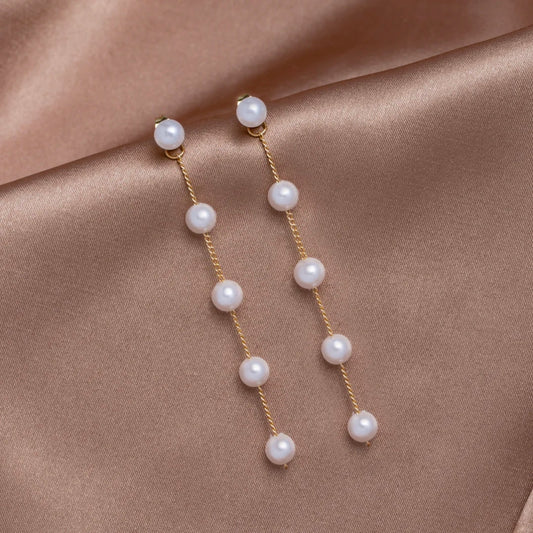 Boucles d’oreilles pendantes perles or – Léa